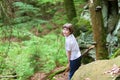 Little boy playing in the woods Royalty Free Stock Photo