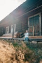 Little boy playing on woodwind flute - ukrainian sopilka. Folk music concept.