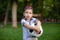 Little boy plays football on the football field gives a pass hits the ball runs across the field and scores a goal Royalty Free Stock Photo