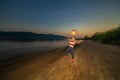 Little boy plays ball on the beach. Royalty Free Stock Photo