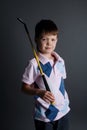 Little boy plays mini golf Royalty Free Stock Photo