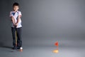 Little boy plays mini golf Royalty Free Stock Photo