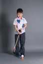 Little boy plays mini golf Royalty Free Stock Photo