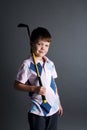 Little boy plays mini golf Royalty Free Stock Photo