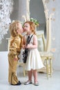 Little boy in pop retro suit kisses a girl Royalty Free Stock Photo