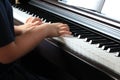 A little boy practices the piano Royalty Free Stock Photo
