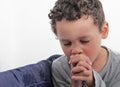 Little boy praying to God stock photo Royalty Free Stock Photo