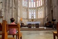 Little boy prays and puts a candle in Orthodox Church Royalty Free Stock Photo