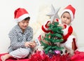 Little boy preparing christmas tree Royalty Free Stock Photo