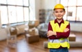 little boy in protective helmet and safety vest Royalty Free Stock Photo