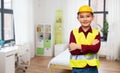 little boy in protective helmet and safety vest Royalty Free Stock Photo