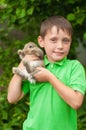 Little boy with a rabbit in his hands Royalty Free Stock Photo