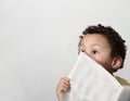 Little boy reading newspaper stock photo