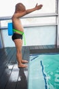 Little boy ready to dive in pool Royalty Free Stock Photo