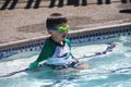 Little boy ready to swim in pool Royalty Free Stock Photo