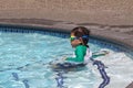 Little boy ready to swim in pool Royalty Free Stock Photo