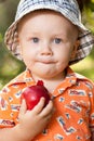 Little boy with a red apple Royalty Free Stock Photo