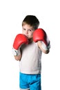 Little boy with red boxing gloves on white background isolated Royalty Free Stock Photo