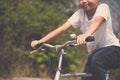 Little boy ride bicycle on the rock road. Royalty Free Stock Photo