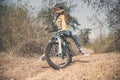 Little boy ride bicycle on the rock road. Royalty Free Stock Photo