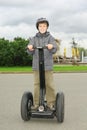 Little boy ride on segway