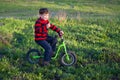 Little boy rides a bicycle Royalty Free Stock Photo