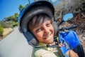 Little boy riding quad bike. Cute child on quadricycle. Motor cross sports on Greece island. Kids summer vacation Royalty Free Stock Photo
