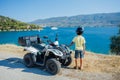 Little boy riding quad bike. Cute child on quadricycle. Motor cross sports on Greece island. Kids summer vacation Royalty Free Stock Photo