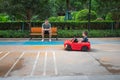 Little boy is riding in a remote controlled car Royalty Free Stock Photo