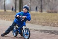 Little boy riding runbike Royalty Free Stock Photo