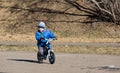 Little boy riding runbike Royalty Free Stock Photo