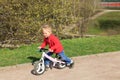Little boy riding runbike Royalty Free Stock Photo