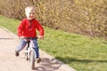 Little boy riding runbike Royalty Free Stock Photo