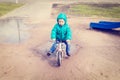 Little boy riding runbike in spring Royalty Free Stock Photo