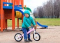 Little boy riding runbike in spring Royalty Free Stock Photo