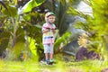 Little boy riding scooter. Kids ride kick board Royalty Free Stock Photo