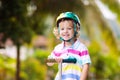 Little boy riding scooter. Kids ride kick board Royalty Free Stock Photo