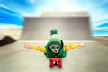 Little boy riding on steep hills to skateboard at the skate Park.Extreme sports. Royalty Free Stock Photo