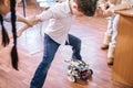 Little boy in robotics school makes robot Royalty Free Stock Photo