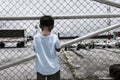 little boy sad standing alone ,vintage tone Royalty Free Stock Photo