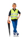 little boy in safety vest and goggles with saw Royalty Free Stock Photo