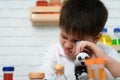 Little boy in science classroom It is the basis for the process of systematic thinking, reasoning, observation, data collection.