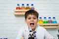 Little boy in science classroom It is the basis for the process of systematic thinking, reasoning, observation, data collection.