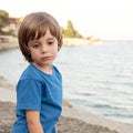 Little boy at the sea shore Royalty Free Stock Photo