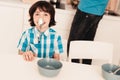 Little Boy in Shirt Have Fun in Kitchen in Morning Royalty Free Stock Photo