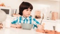 Little Boy in Shirt Have Fun in Kitchen in Morning Royalty Free Stock Photo