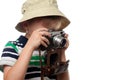 Little boy shooting on the vintage photo camera Royalty Free Stock Photo