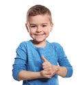 Little boy showing HELP gesture in sign language on white