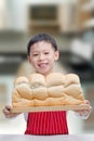 Little boy showing his bread Royalty Free Stock Photo