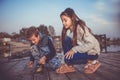 Little boy showing his friend a fish caught Royalty Free Stock Photo